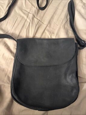 Roots vintage leather saddle crossbody bag